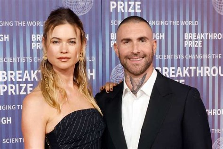 Maroon 5’s Adam Levine and Wife Behati Prinsloo Look Loved Up During Rare Appearance: Photos