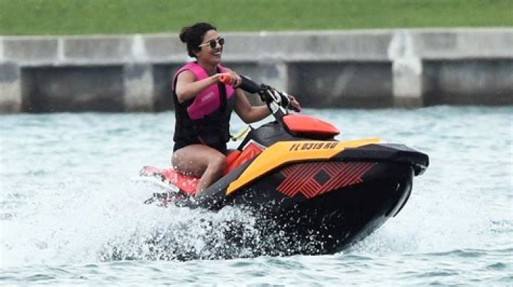Priyanka Chopra Looks Like a Total Badass Jet-Skiing in a Tiny Black Bikini on Family Vacation